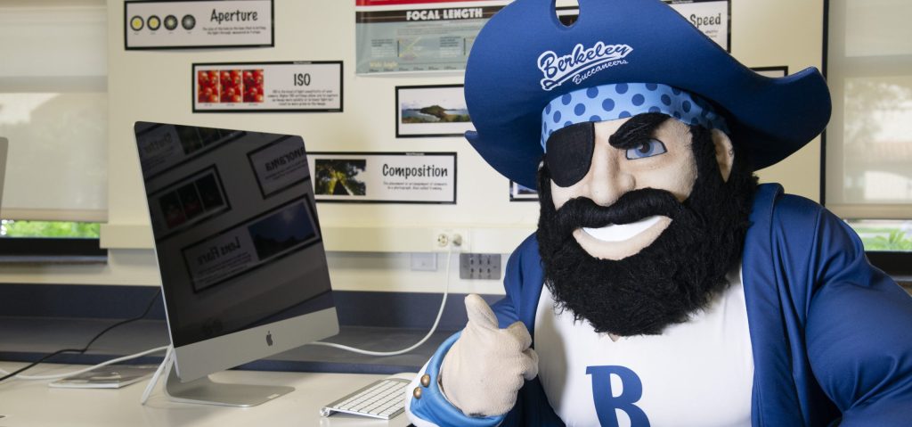 mascot with thumbs up, private school, tampa fla