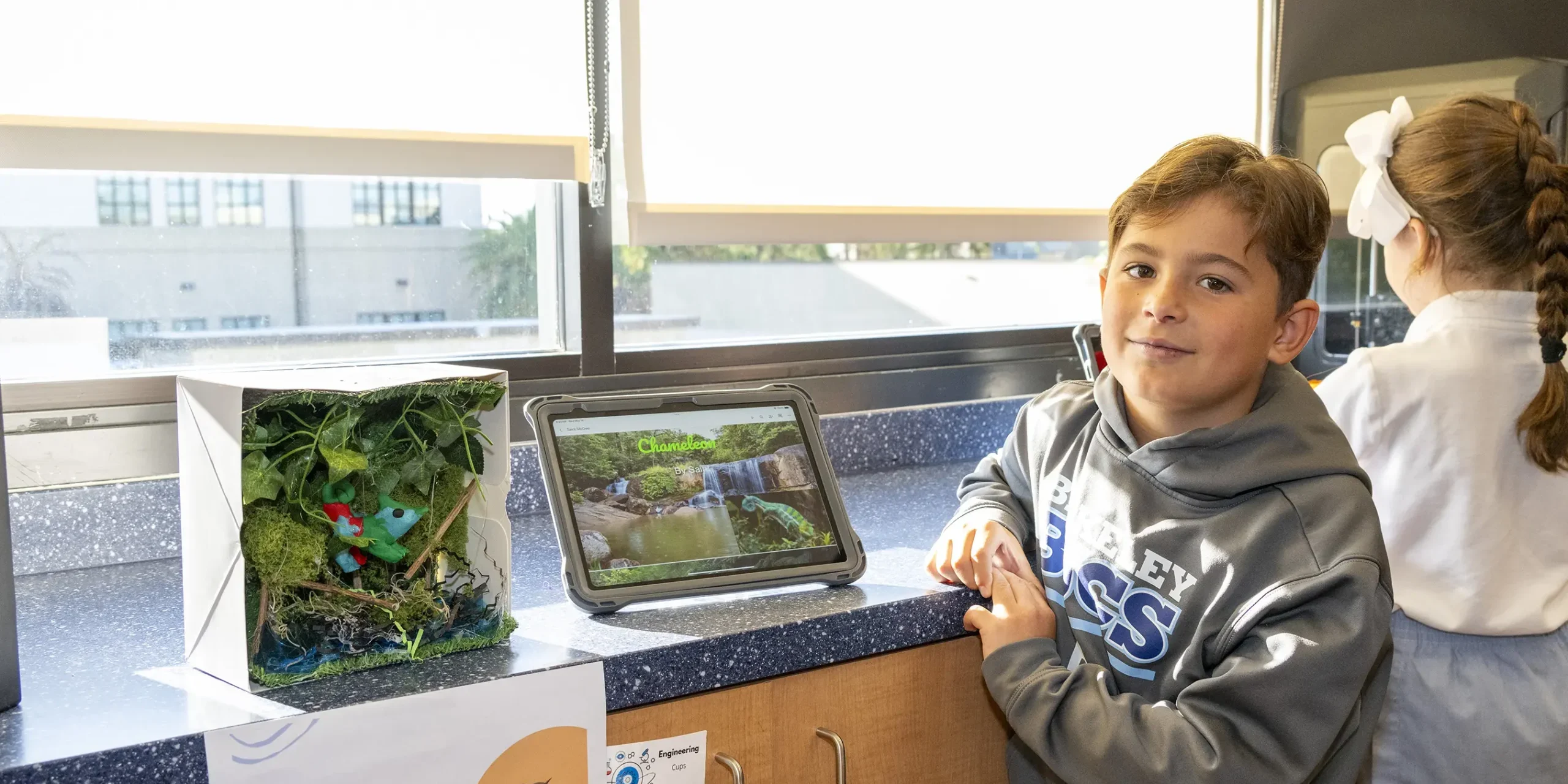 Lower Division Student using iPad in Science Class