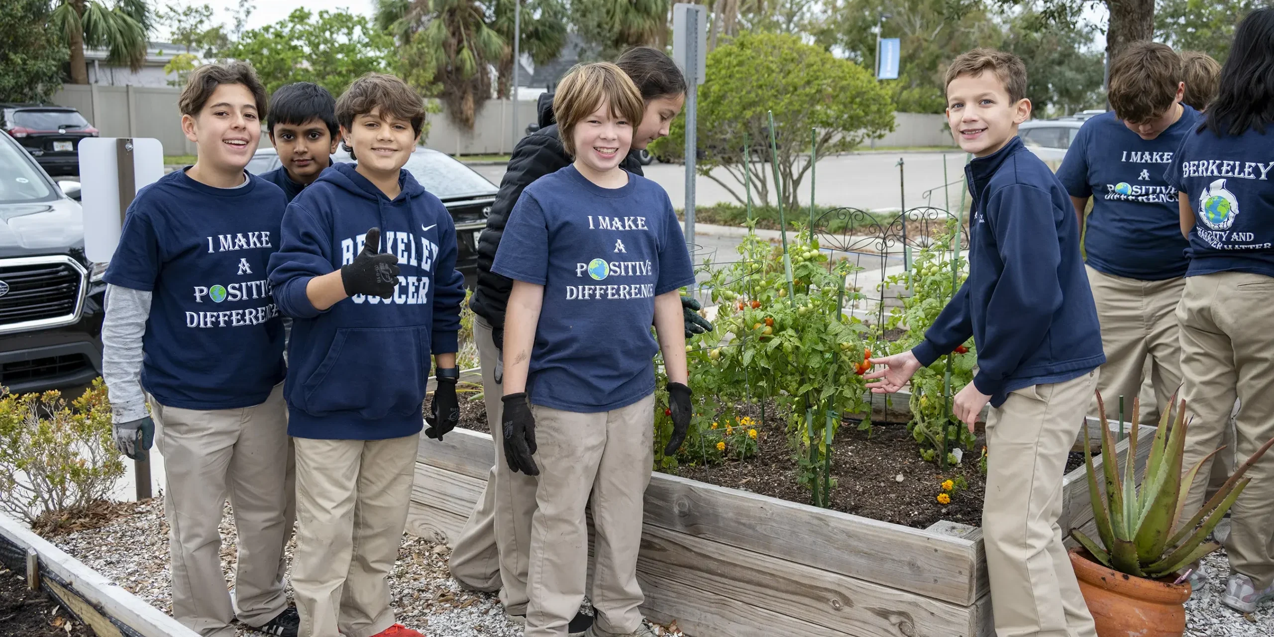 Middle Division Students working in the Garden