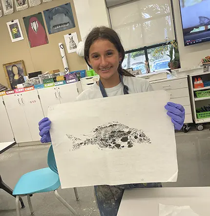 Middle DIvision Student doing art project