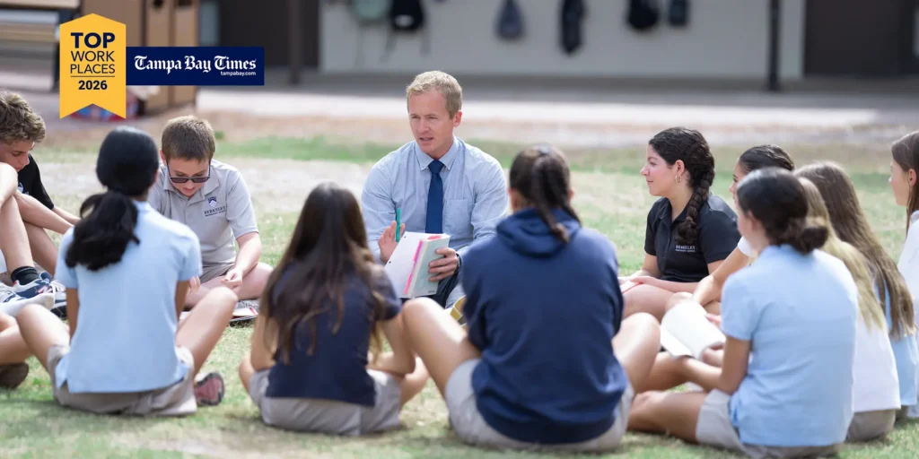 Brandon Maxwell having class on the McCleary Mound with Middle Division Students